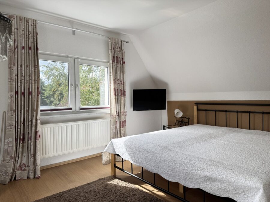 18374 Ostseeheilbad Zingst, Einfamilienhaus zum Kauf | Schlafzimmer 2a OG_7692 | Reiser Immobilien